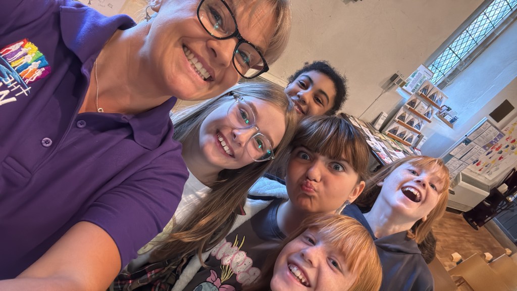 The Way group with leader taking group selfie